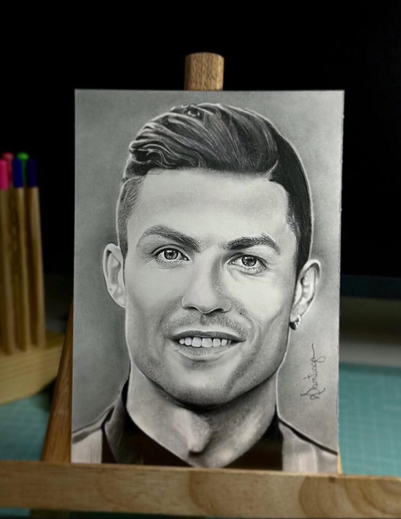Realistic drawing of Cristiano Ronaldo on an easel illustrating an idea for drawing