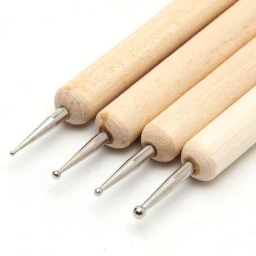 quatro boleadores de tamanhos variados